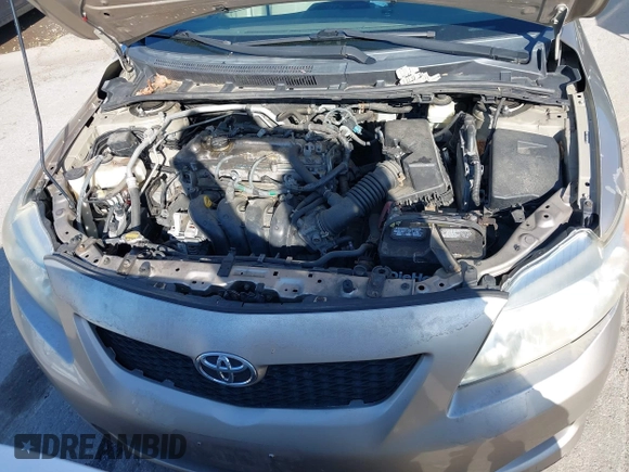 2009 Toyota Corolla with VIN 2T1BU40E99C028401, listed as a IAAI auction lot 42136344 with 163,888 mi miles. Bid and sale history available at carsss.com. Image 10.