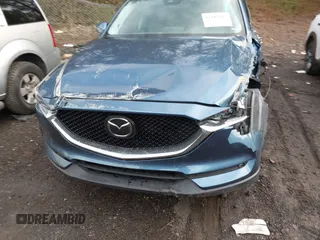 2020 Mazda CX-5 Grand Touring with VIN JM3KFADM4L0827733, listed as a IAAI auction lot 41482517 with 43,597 mi miles. Bid and sale history available at carsss.com. Image 12.