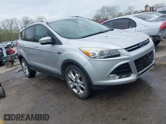 2015 Ford Escape Titanium with VIN 1FMCU9JX2FUA24279, listed as a IAAI auction lot 41930868 with 254,997 mi miles. Bid and sale history available at carsss.com. Image 1.