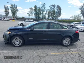 2015 Ford Fusion SE Hybrid with VIN 3FA6P0LU7FR199065, listed as a IAAI auction lot 41944181 with 197,020 mi miles. Bid and sale history available at carsss.com. Image 14.