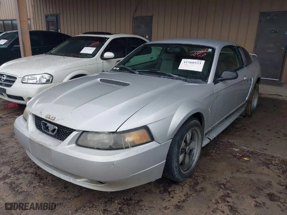 2001 Ford Mustang Standard with VIN 1FAFP40411F232997, listed as a IAAI auction lot 41560523 with 234,743 mi miles. Bid and sale history available at carsss.com. Image 2.