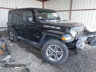 2020 Jeep Wrangler Unlimited Sahara High Altitude with VIN 1C4HJXEG1LW208565, listed as a IAAI auction lot 41566794 with 39,264 mi miles and . Bid and sale history available at DreamBid. Image 1.
