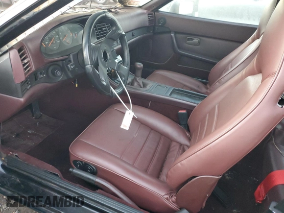 1986 Porsche 944 with VIN WP0AA0951GN156691, listed as a Copart auction lot 79901794 with 694,360 mi miles and Salvage Title. Bid and sale history available at DreamBid. Image 7.
