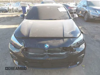 2021 BMW 2 Series 228i xDrive with VIN WBA73AK03M7H66827, listed as a IAAI auction lot 41682959 with 57,875 mi miles and . Bid and sale history available at DreamBid. Image 10.
