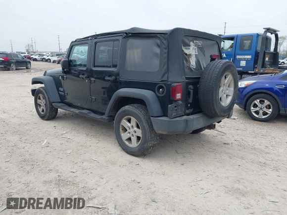 2007 Jeep Wrangler Unlimited X with VIN 1J4GA39177L153387, listed as a IAAI auction lot 42021211 with 207,965 mi miles and . Bid and sale history available at DreamBid. Image 3.