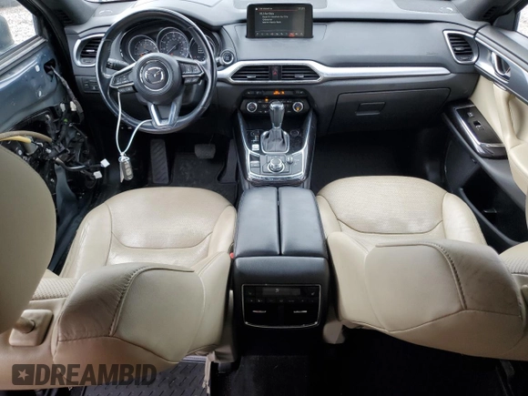 2018 Mazda CX-9 Grand Touring with VIN JM3TCADY7J0211781, listed as a Copart auction lot 59477885 with 77,667 mi miles and Salvage title. Bid and sale history available at DreamBid. Image 8.