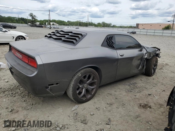 2011 Dodge Challenger z VIN 2B3CJ4DG5BH570472, wystawiony jako Copart lot #58479265 z przebiegiem Nie podano mil oraz Szkoda całkowita • Salvage title. Historia ofert i sprzedaży dostępna na DreamBid. Obrazek 3.