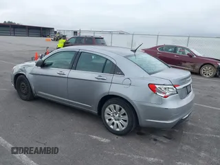2013 Chrysler 200 LX with VIN 1C3CCBABXDN640536, listed as a IAAI auction lot 39425402 with 188,960 mi miles. Bid and sale history available at carsss.com. Image 3.