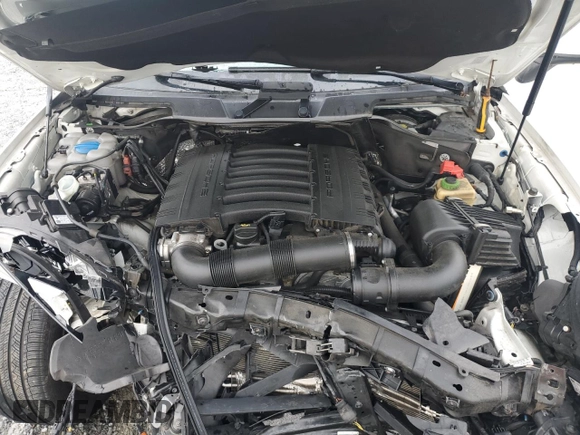 2016 Porsche Cayenne z VIN WP1AA2A25GLA10575, wystawiony jako Copart lot #56941595 z przebiegiem Nie podano mil oraz Szkoda całkowita • Salvage title. Historia ofert i sprzedaży dostępna na DreamBid. Obrazek 12.