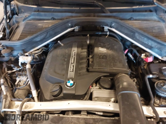 2012 BMW X5 35i with VIN 5UXZV4C55CL990510, listed as a IAAI auction lot 41849293 with 117,522 mi miles and . Bid and sale history available at DreamBid. Image 10.
