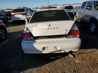 2003 Mitsubishi Lancer LS with VIN JA3AJ36E83U086319, listed as a Copart auction lot 80986464 with 130,043 mi miles and Salvage Title. Bid and sale history available at carsss.com. Image 6.
