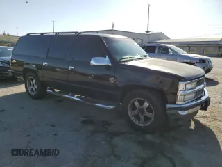 1999 Chevrolet Suburban with VIN 3GNEC16R3XG270099, listed as a Copart auction lot 71041704 with 269,329 mi miles and Salvage Title. Bid and sale history available at carsss.com. Image 4.