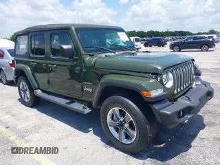 2022 Jeep Wrangler Unlimited Sahara z VIN 1C4HJXEN3NW242458, wystawiony jako IAAI lot #42352073 z przebiegiem 26 154 mil mil oraz . Historia ofert i sprzedaży dostępna na DreamBid. Obrazek 1.