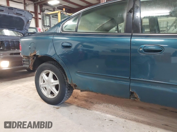 2003 Oldsmobile Alero GL1 with VIN 1G3NL52F13C204109, listed as a IAAI auction lot 42084040 with Not Provided miles and . Bid and sale history available at DreamBid. Image 12.