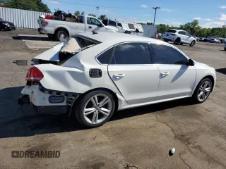 2014 Volkswagen Passat SE z VIN 1VWBN7A30EC022997, wystawiony jako Copart lot #57582285 z przebiegiem 94 920 mil mil oraz Szkoda całkowita • Salvage title. Historia ofert i sprzedaży dostępna na DreamBid. Obrazek 3.