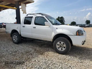 2001 Nissan Frontier SE with VIN 1N6ED27T91C344946, listed as a Copart auction lot 57488105 with 183,127 mi miles and Salvage title. Bid and sale history available at DreamBid. Image 4.