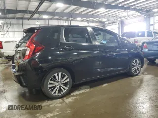 2015 Honda Fit EX-L z VIN 3HGGK5H88FM721318, wystawiony jako Copart lot #56717255 z przebiegiem 107 235 mil mil oraz Szkoda całkowita • Salvage title. Historia ofert i sprzedaży dostępna na DreamBid. Obrazek 3.