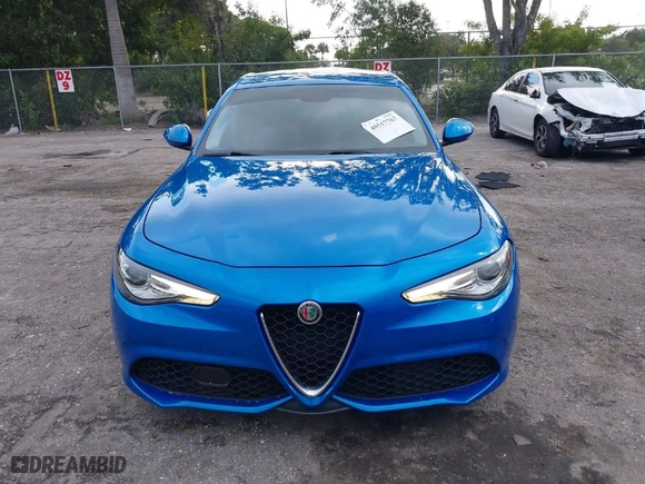 2017 Alfa Romeo Giulia with VIN ZARFAEDN9H7558626, listed as a IAAI auction lot 40517767 with 99,040 mi miles. Bid and sale history available at carsss.com. Image 12.