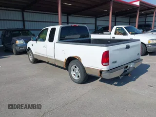 2000 Ford F-150 XL z VIN 1FTRX17W0YNB25467, wystawiony jako IAAI lot #42474329 z przebiegiem Nie podano mil oraz . Historia ofert i sprzedaży dostępna na DreamBid. Obrazek 3.