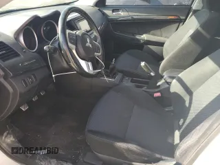 2015 Mitsubishi Lancer Evolution GSR with VIN JA32W8FV4FU024603, listed as a Copart auction lot 74699914 with 81,311 mi miles and Salvage Title. Bid and sale history available at carsss.com. Image 7.