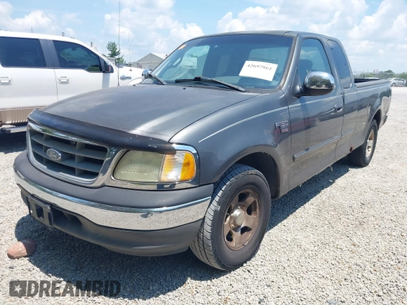 2002 Ford F-150 XL with VIN 1FTRX17W22NA43571, listed as a IAAI auction lot 42697861 with Not provided miles and . Bid and sale history available at DreamBid. Image 2.