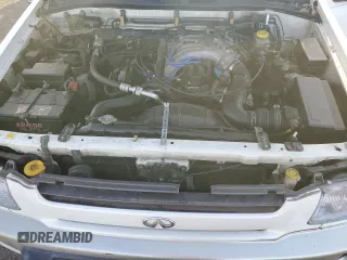 1998 Infiniti QX4 z VIN JNRAR05Y9WW027079, wystawiony jako Copart lot #72374434 z przebiegiem 206 587 mil mil oraz Szkody całkowita. Historia ofert i sprzedaży dostępna na DreamBid. Obrazek 11.