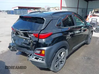 2018 Hyundai Kona Limited with VIN KM8K33A58JU078785, listed as a IAAI auction lot 41808445 with 58,738 mi miles. Bid and sale history available at carsss.com. Image 4.