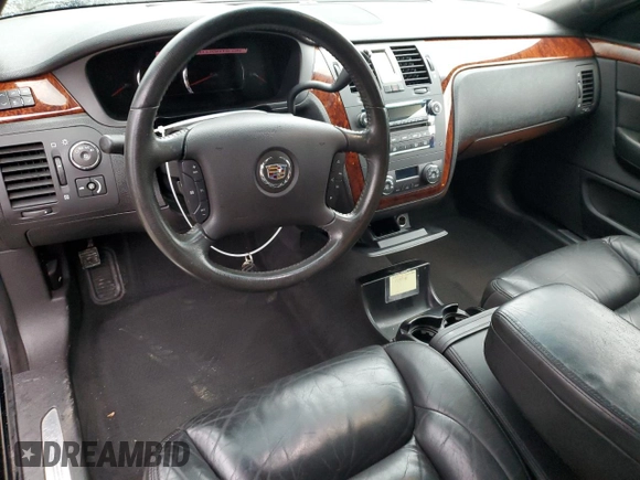 2006 Cadillac DTS Professional z VIN 1GEEH06Y86U500282, wystawiony jako Copart lot #81234904 z przebiegiem 61 611 mil mil oraz Szkoda całkowita • Salvage title. Historia ofert i sprzedaży dostępna na DreamBid. Obrazek 8.