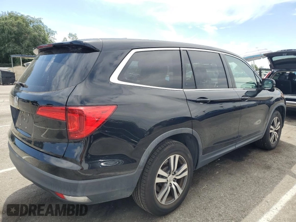 2017 Honda Pilot EX-L with VIN 5FNYF5H50HB000771, listed as a Copart auction lot 52611255 with 84,922 mi miles and Salvage Title. Bid and sale history available at carsss.com. Image 3.