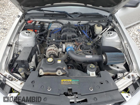 2007 Ford Mustang Deluxe z VIN 1ZVFT80N275364703, wystawiony jako Copart lot #56668525 z przebiegiem 183 132 mil mil oraz Czysty tytuł • Clean title. Historia ofert i sprzedaży dostępna na DreamBid. Obrazek 11.
