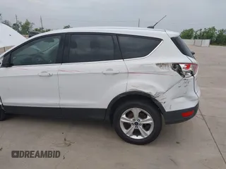 2016 Ford Escape SE z VIN 1FMCU0G79GUC41641, wystawiony jako IAAI lot #42103256 z przebiegiem 153 792 mil mil oraz . Historia ofert i sprzedaży dostępna na DreamBid. Obrazek 6.