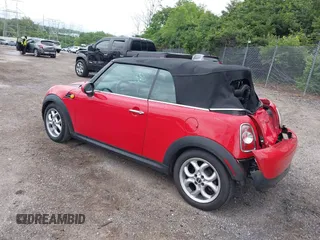 2011 MINI Convertible with VIN WMWZN3C59BTZ89447, listed as a IAAI auction lot 42313009 with 62,009 mi miles and . Bid and sale history available at DreamBid. Image 3.