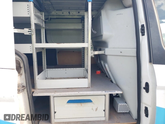 2014 Ford Transit Connect XL z VIN NM0LS7E75E1172769, wystawiony jako Copart lot #64703265 z przebiegiem 115 267 mil mil oraz Czysty tytuł • Clean title. Historia ofert i sprzedaży dostępna na DreamBid. Obrazek 11.