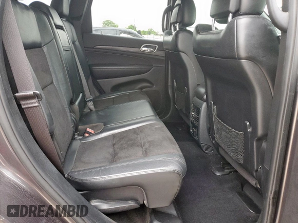 2019 Jeep Grand Cherokee Altitude z VIN 1C4RJEAG4KC811167, wystawiony jako Copart lot #55943695 z przebiegiem 131 090 mil mil oraz Szkoda całkowita • Salvage title. Historia ofert i sprzedaży dostępna na DreamBid. Obrazek 10.