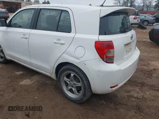 2008 Scion xD with VIN JTKKU104X8J001399, listed as a IAAI auction lot 41638009 with 220,468 mi miles. Bid and sale history available at carsss.com. Image 6.