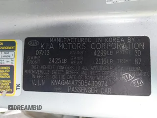 2013 Kia Optima LX with VIN KNAGM4A75D5430974, listed as a IAAI auction lot 41209055 with 197,871 mi miles. Bid and sale history available at carsss.com. Image 9.