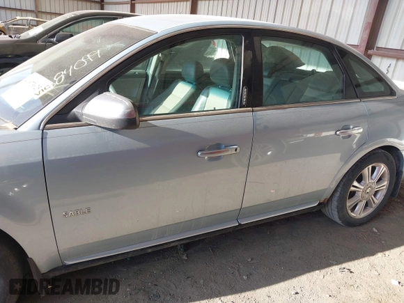 2008 Mercury Sable Premier z VIN 1MEHM42W78G627375, wystawiony jako IAAI lot #41973625 z przebiegiem 205 992 mil mil oraz . Historia ofert i sprzedaży dostępna na DreamBid. Obrazek 14.
