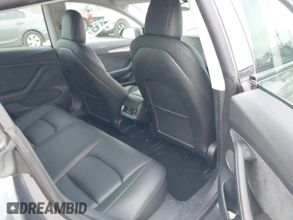 2023 Tesla Model 3 with VIN 5YJ3E1EA5PF474382, listed as a IAAI auction lot 41764268 with 31,040 mi miles and . Bid and sale history available at DreamBid. Image 8.