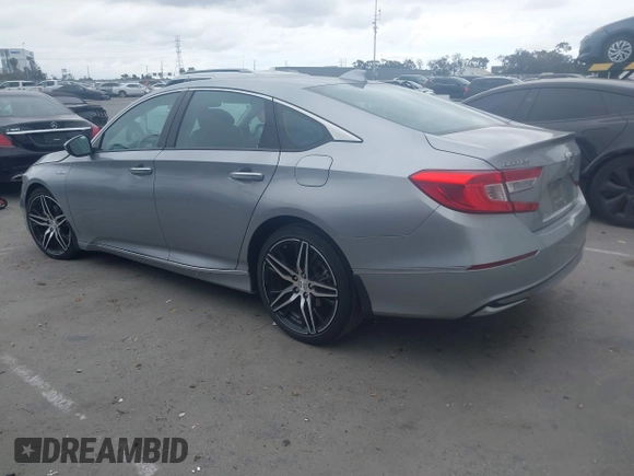 2021 Honda Accord Touring with VIN 1HGCV3F99MA020450, listed as a IAAI auction lot 42194371 with 19,206 mi miles and . Bid and sale history available at DreamBid. Image 3.
