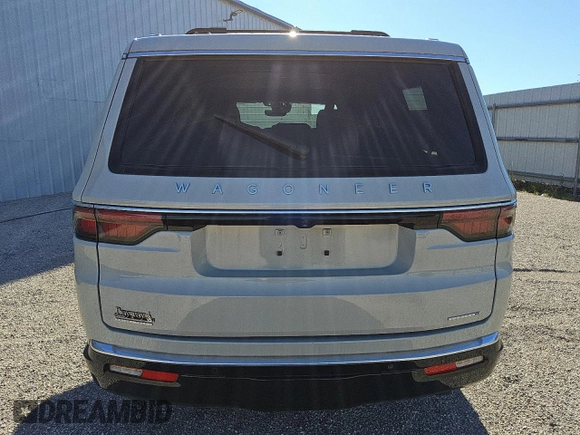 2022 Jeep Wagoneer Series II z VIN 1C4SJVBT2NS142260, wystawiony jako Copart lot #41593515 z przebiegiem 26 365 mil mil oraz Czysty tytuł • Clean title. Historia ofert i sprzedaży dostępna na DreamBid. Obrazek 6.