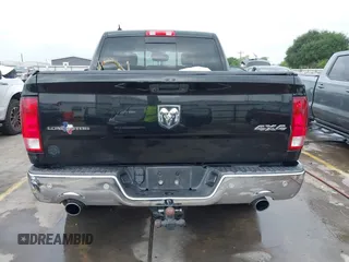 2015 Ram 1500 Outdoorsman with VIN 1C6RR7LM6FS748048, listed as a IAAI auction lot 42162715 with 144,181 mi miles and . Bid and sale history available at DreamBid. Image 17.