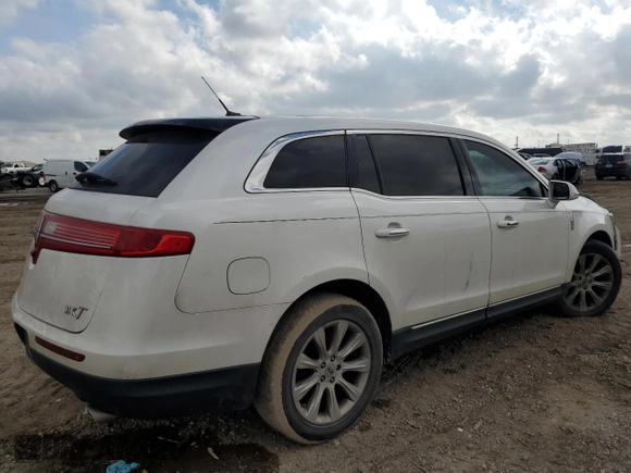 2014 Lincoln MKT with VIN 2LMHJ5FK3EBL54865, listed as a Copart auction lot 43979445 with 54,820 mi miles and Salvage Title. Bid and sale history available at DreamBid. Image 3.