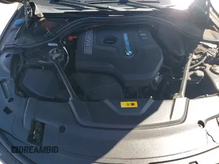 2018 BMW 7 Series 740e xDrive with VIN WBA7J2C55JG938385, listed as a Copart auction lot 49109985 with 81,567 mi miles and Salvage title. Bid and sale history available at DreamBid. Image 15.