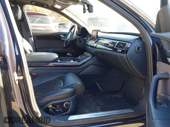 2017 Audi A8 L Sport with VIN WAU43AFDXHN003685, listed as a IAAI auction lot 41264314 with 114,828 mi miles. Bid and sale history available at carsss.com. Image 5.