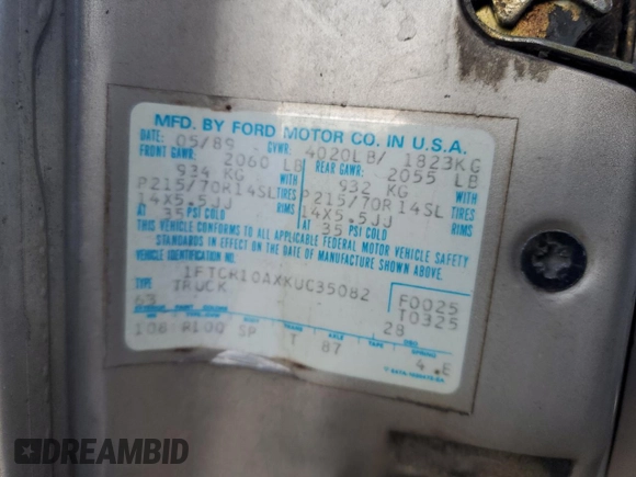 1989 Ford Ranger XL with VIN 1FTCR10AXKUC35082, listed as a Copart auction lot 42209825 with 754,095 mi miles and Salvage title. Bid and sale history available at DreamBid. Image 12.
