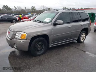 2006 GMC Envoy Denali with VIN 1GKET63M262240313, listed as a IAAI auction lot 41605984 with 199,896 mi miles. Bid and sale history available at carsss.com. Image 2.