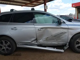 2015 Volvo XC60 T6 Platinum с VIN YV4902RMXF2719971, выставлен на аукционе IAAI как лот 41970301 с пробегом 63 399 миль миль и . История ставок и продаж доступна на DreamBid. Изображение 13.