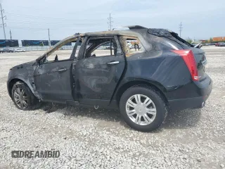 2015 Cadillac SRX Luxury Collection z VIN 3GYFNBE31FS612780, wystawiony jako Copart lot #56149815 z przebiegiem Nie podano mil oraz Nie do naprawy • Non repairable. Historia ofert i sprzedaży dostępna na DreamBid. Obrazek 2.