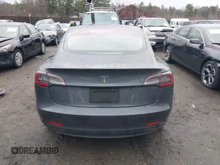 2019 Tesla Model 3 Mid Range with VIN 5YJ3E1EA3KF307415, listed as a IAAI auction lot 41673239 with 42,895 mi miles and . Bid and sale history available at DreamBid. Image 16.