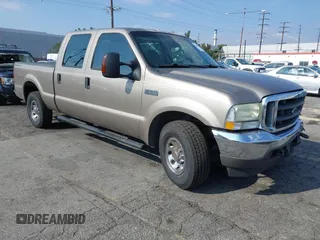 2004 Ford Super Duty F-250 XL with VIN 1FTNW20L64ED90699, listed as a IAAI auction lot 41436621 with 221,586 mi miles. Bid and sale history available at carsss.com. Image 1.